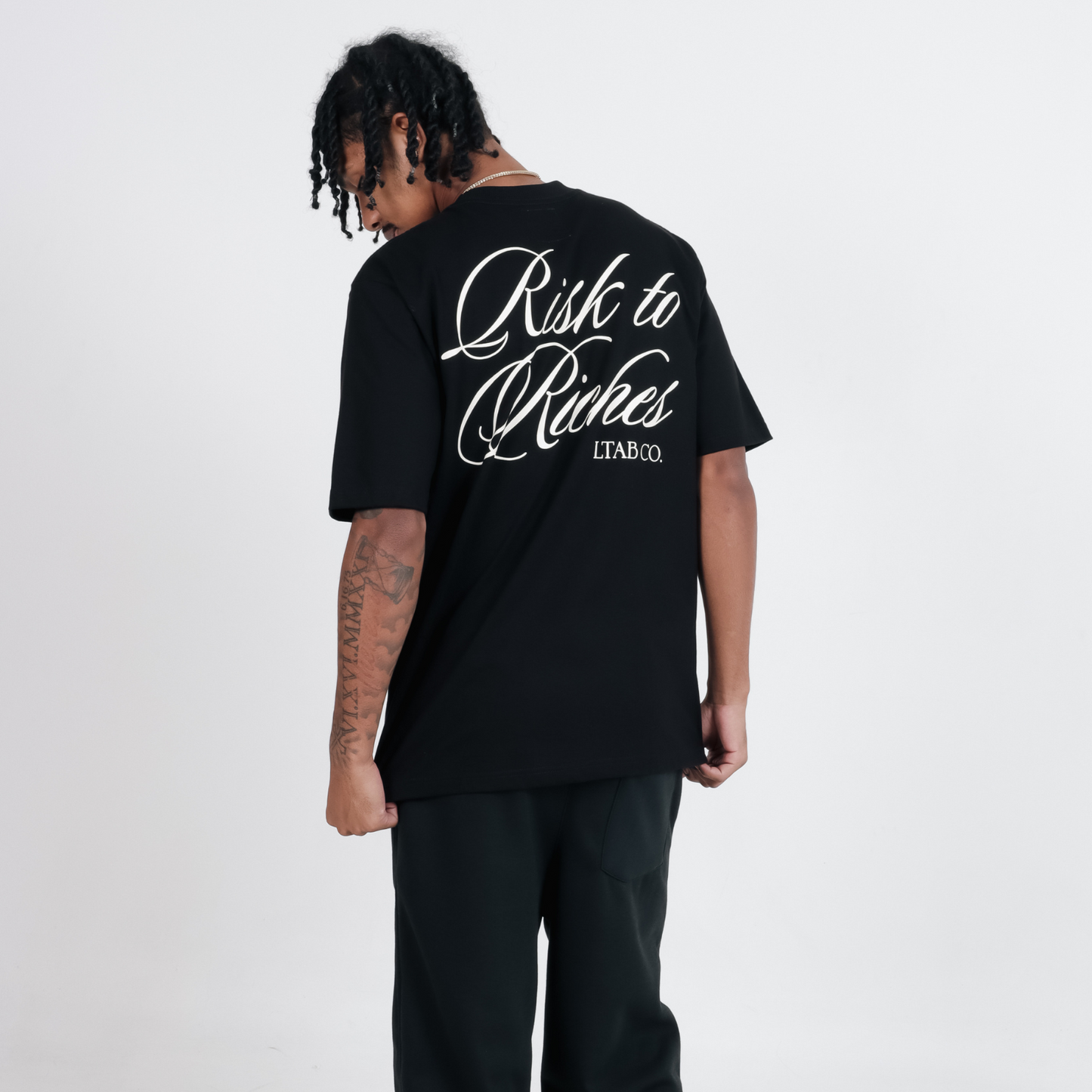 Risk To Riches | Timeless In Black Collection